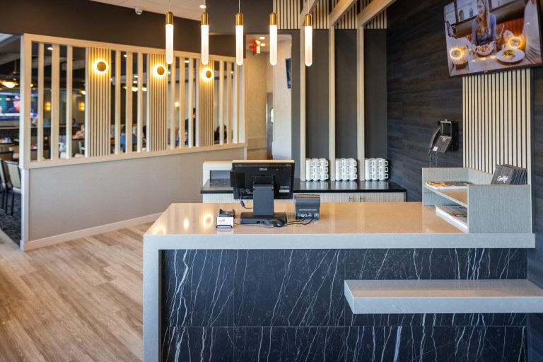 Modern host stand and dining room at Smitty's Meadowood in St. Vital